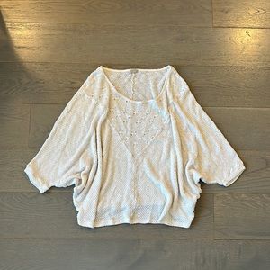 Soft off-white batwing poncho sweater light knit weave